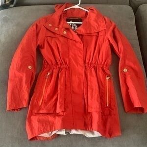 EUC G.E.T. equipment. general. technique bright orange rain coat.